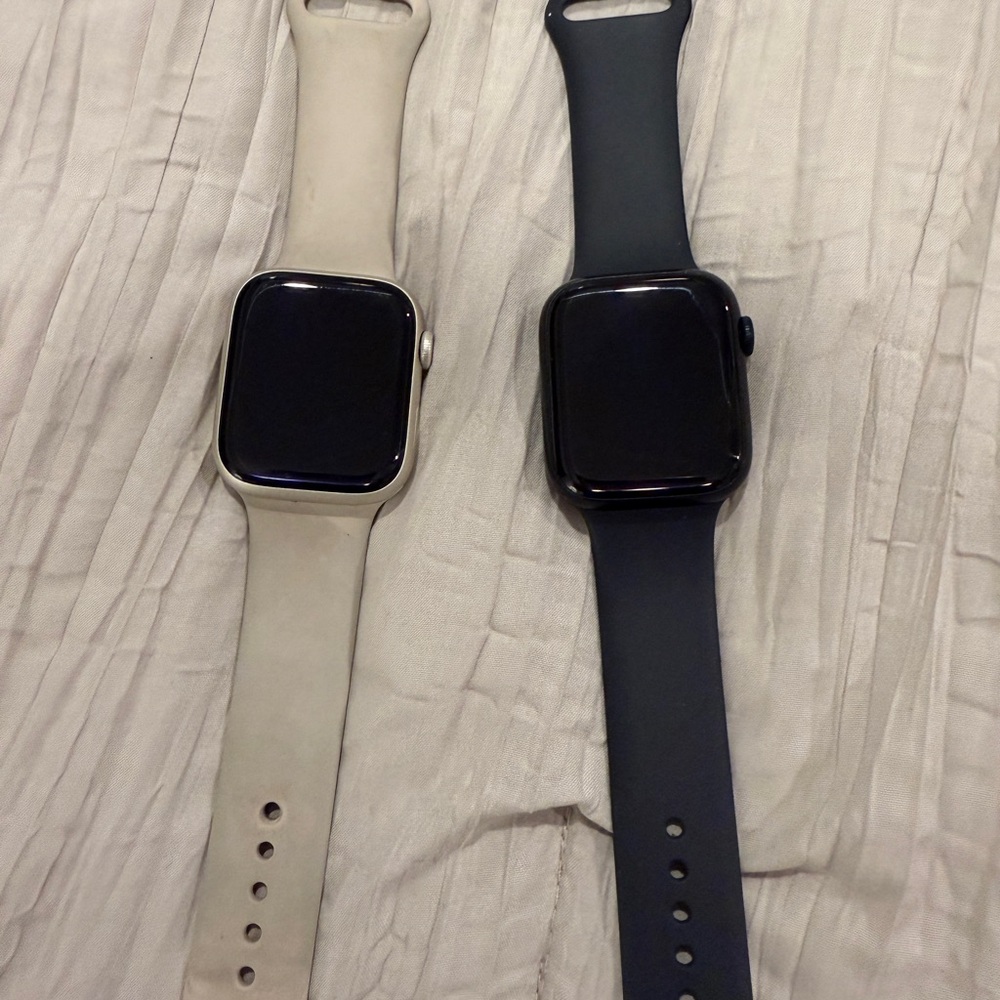 Apple Watches Pink is a Series 8 and the black is a series 7.